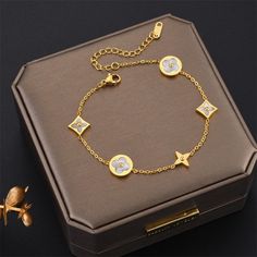 Product name: 5 flower bracelet Material: Titanium steel Packaging: gift box Color: rose gold,gold Remarks Statement: We use vacuum furnace electroplating for color plating, and the material is also selected 316 titanium steel, no discoloration, no rust, no allergy, no black, wear-resistant, green and environmental protection Bracelets Elegant, Four Leaf Clover Charm, Hair Bracelet, Designer Bracelet, Girl Couple, Clover Charm, Packaging Gift, Lucky Clover, Four Leaf