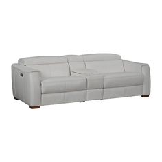 a white leather couch with two recliners on it's back and one arm facing the camera