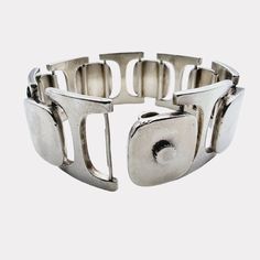 NO. 1210B very RARE vintage Silver Modernist Bracelet from the designer Bent Knudsen, Denmark, 1973. Hallmark: Sterling Denmark Bent K Weight: 92.58 g Size: approx. 18 cm - width: approx. 25 mm Condition: good with some signs of vintage pieces Note: We sell antique/vintage pieces of jewelry, so there might be some signs of wear due to their age. Please look at the photos carefully before placing a bid! Modernist Jewelry, Selling Antiques, Bracelet Ideas, Vintage Pieces, Antique Vintage, Vintage Silver, Hallmark, Denmark, Bangle Bracelets