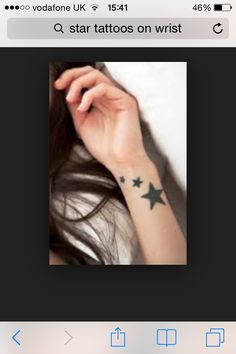 a person with a star tattoo on their arm