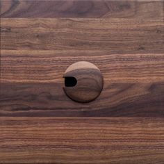 a wooden board with a hole in the middle