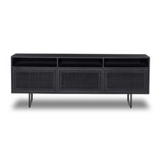 an entertainment unit with wicker doors and drawers on one side, in black finish