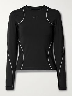 Nike's top is designed with contouring reflective piping, ensuring you're visible during early-morning or late-night runs. It's cut for a close fit from moisture-wicking Dri-FIT that's smooth and flexible. Sporty Compressive Nike Top, Compressive Sporty Nike Top, Nike Functional High Stretch Tops, Functional Nike High Stretch Tops, Fitted Nylon Tops For Running, Functional Fitted Activewear With Reflective Details, Nike Fitted Functional Tops, Nike Fitted Tops, Fitted Nike Tops