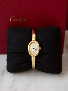 Gold Bangle Watch, Cartier Tank Americaine, Bangle Watches, Yellow Gold Bangle, Cartier Tank, History Design, Gold Bangles, Quartz Movement, Cartier