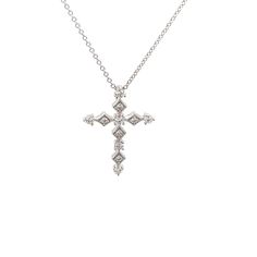 Description: 18 karat white gold diamond cross necklace. This necklace contains 0.32 carat.  *ALL THESE PHOTOS WERE TAKEN WITH AN ORDINARY IPHONE & HAVE NOT BEEN EDITED OR ENHANCED IN ANY WAY* - All diamonds are natural F-G in color and VS in clarity.  - Adjustable - Material: White-gold - Handmade This product can be made in yellow, rose, white-gold, and platinum. Customizations may make changes in price. **Reminder: Any personalized item is not eligible for return or exchange**. Diamond White Diamond Cross Necklace For Anniversary, Diamond White Cross Necklace With Diamond Cut For Anniversary, Diamond Cut Cross Necklace In Diamond White For Anniversary, Diamond White Cross Necklace For Anniversary, White Gold Diamond Cross Necklace For Wedding, Diamond White Fine Jewelry Cross Necklace For Anniversary, Diamond Cross Necklace With Accents For Anniversary, Diamond Cross Pendant Necklace For Wedding, Wedding Diamond Necklace With Cross Pendant