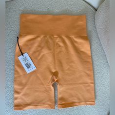 Weworewhat Biker Shorts Orange Size: Small New With Tags 88$ These Are Perfect Biker Shorts, So Fun For Summer. Love The Color! Sold In Revolve! Trendy Fitted High Waist Athletic Shorts, Trendy Fitted Orange Shorts, Trendy High Waist Biker Shorts With Built-in Shorts, High Waist Biker Shorts For Summer, Stretch High Waist Bermuda Shorts With Built-in Shorts, Summer Activewear With Built-in Shorts Above Knee, High Waist 2-in-1 Biker Shorts For Summer, Casual High Waist Biker Shorts With Built-in Shorts, Fitted Orange Activewear Shorts