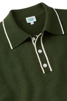 Experience the luxurious feel of our Forest Green Merino Wool Polo. Made with high-quality wool, this polo is both sporty and classic. The rich olive green color adds a touch of sophistication to any outfit. Details Extra fine merino blend Mother-of-pearl buttons True to size Model is 6' 1" 190 wearing a size Large Green Fitted Classic Polo Shirt, Green Wool Casual Tops, Casual Green Wool Tops, Green Polo Collar Top For Fall, Classic Green Polo Collar Sweater, Fitted Green Long Sleeve Polo Shirt, Classic Fitted Green Polo Sweater, Green Fitted Classic Polo Sweater, Fitted Classic Green Polo Sweater