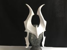 "White leather Cosplay horns / 18 inch tall headpiece, a unique addition to a villian or Comicon costume. CosPlay as a Snow Queen, RolePlay as an evil Master or Dominatrix! ORDER ANY COLOR Great for Carnival, Mardis Gras, Renaissance Faire, Halloween, or Masquerade ball! ♦ COMFORTABLE & ADJUSTABLE ♦ Secured with ties for adjustability, supple leather is formed to facial contours. SHOWN IN MATTE (Glossy available by request.) ORDER ANY COLOR ♦ Match your costume, Free! -- Professionally airbr White Elven Costume For Fantasy Events, White Fantasy Costume Accessories For Fantasy Events, White Fantasy Style Costume Accessories For Fantasy Events, White Themed Cosplay Costume For Fantasy Events, White Themed Costume For Fantasy Events, White Themed Costumes For Fantasy Events, Themed White Costumes For Fantasy Events, White Fantasy Costume Accessories For Cosplay, White Fantasy Costumes For Themed Events