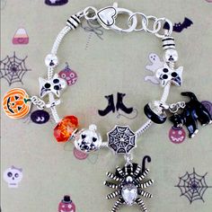 New Halloween Themed Charm Bracelet In Silver Tone. Super Cute Charms And Clasp! Novelty Silver Halloween Bracelet, Silver Themed Bracelet For Halloween, Novelty Silver Bracelet For Halloween, Halloween Themed Silver Bracelet, Silver Halloween Novelty Bracelet, Halloween Charm Bracelet Gift, Halloween Gift Charm Bracelet, Halloween Charm Bracelet, Bracelet In Silver