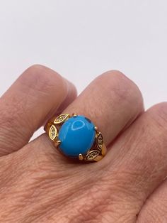 Vintage turquoise gold filled Cocktail Ring  Unusual deep turquoise howlite  Handmade in 1970s My jeweler can re size this for a $20 fee  Gold filled  Does not tarnish All rings are shipped in a nice gift box.   Check out our over a THOUSAND great reviews Engraving is $4 per letter and is not always perfect depending on the piece. It can take a few days if the jeweler is busy. This is payable to Paypal Judithsltd@gmail.com  PLEASE NOTE If we have multiples of the same vintage item, it is because Gold Turquoise Ring Gift, Gold Turquoise Ring For Gift, Gold Oval Turquoise Ring Gift, Oval Gold Turquoise Ring Gift, Gold Oval Turquoise Ring For Anniversary, Gold Oval Hallmarked Turquoise Ring, Gold Turquoise Ring With Oval Cabochon, Vintage Turquoise Gemstone Ring For Gift, Vintage Turquoise Ring Gift