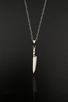 Get ready to make a bold statement with our Chef Knife Gifts Pendant. Perfect for culinary enthusiasts, aspiring chefs, or anyone who appreciates unique accessories, this pendant is a must-have addition to your jewelry collection. Skillfully crafted with attention to detail, this unisex piece of jewelry is designed to be a conversation starter, offering a stylish nod to the world of gastronomy. So why wait? Add a touch of culinary elegance to your style with our Chef Knife Gifts Pendant. It's no Tiny Knife, Knife Jewelry, Chef Necklace, Silver Knife, Knife Necklace, Gift For Chef, Gifts For Hubby, Tiny Pendant, Knife Gifts