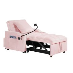 a pink couch with wheels and a pull out bed