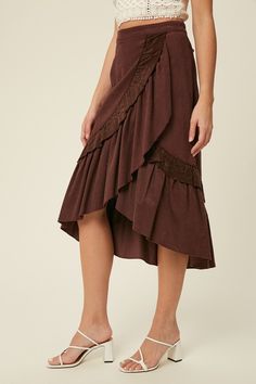 Introducing our Corduroy Wrap Skirt in Deep Plum - a must-have addition to your fall wardrobe. Crafted from soft corduroy, this mid-length skirt features a double-layered ruffle that adds volume and movement to your every step. The hi-low round hem adds a touch of playful elegance to this wrap style skirt. Ideal for any occasion, this skirt is perfect for pairing with your favorite boots and sweater. Our model is 5' 10" and wearing a size S. S 4/6M 8/10L 12/14 Corduroy Skirts, Gold Clothing, Mid Skirt, Cozy Dress, Gold Outfit, Deep Plum, Favorite Boots, Corduroy Skirt, Mid Length Skirts