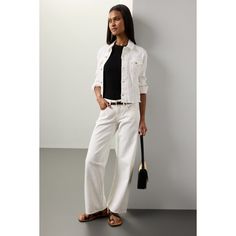 White (81% Cotton, 11% Lyocell, 6% Elasterell-P, 2% Elastane). Jacket. Long sleeves. Front button closure. 20.5" from shoulder to hemline. Imported. White Utility Jacket With Button Closure For Work, Elegant Long Sleeve Denim Jacket For Work, Elegant Fall Denim Jacket For Workwear, Chic Relaxed Fit Denim Jacket For Work, Versatile White Outerwear For Work, Spring Relaxed Fit Denim Work Jacket, Single Breasted Denim Jacket For Spring Workwear, White Spring Outerwear For Business Casual, Chic Spring Denim Jacket For Work