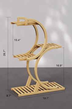 a wooden shelf with two shelves on each side and measurements for the bottom half of it