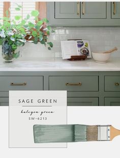 a kitchen with green cabinets and white counter tops