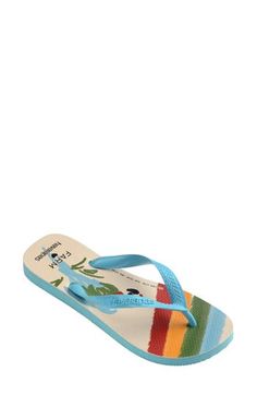 Enjoy the summery look and cushioned comfort of this flexible flip-flop featuring a colorful tropical print designed in collaboration with fellow Brazilian brand FARM Rio. Cushioned footbed Synthetic upper and lining/rubber sole Made in Brazil Fun Slip-on Flip Flops For The Beach, Multicolor Synthetic Flip Flops For Swimming, Casual Flip Flops With Branded Insole For Beach, Flat Flip Flops With Branded Insole For Vacation, Blue Tropical Sandals For Beach Season, Fun Beach Flip Flops, Beach Multicolor Cushioned Slippers, Multicolor Cushioned Synthetic Flip Flops, Blue Tropical Style Flip Flops For Vacation