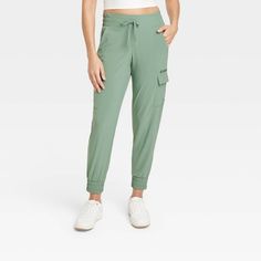 Women's Flex Woven Mid-Rise Cargo Joggers - All In Motion™ Green S Green Athleisure Cargo Pants For Outdoor Activities, Green Athleisure Cargo Pants For Outdoor, Nylon Joggers With 4-way Stretch And Pockets, Casual 4-way Stretch Joggers For Outdoor, Sporty Green Joggers For Outdoor Activities, Functional Midweight Joggers With Pockets, Relaxed Fit Cargo Joggers Athleisure, Green Athleisure Cargo Pants For Sports, Relaxed Fit Cargo Style Athleisure Joggers