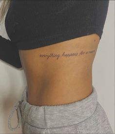 a woman's stomach with the words everything happens for a reason written on it