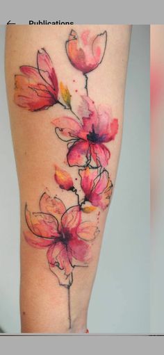 a woman's leg with flowers painted on it