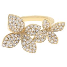 Introducing our breathtaking 1.00 Carat Diamond Double Flower Statement Ring in 18K Yellow Gold. This mesmerizing piece combines elegance and whimsy with its enchanting design. Two stunning blooms, embellished with sparkling diamonds, create a captivating focal point. The open-style ring adds a modern twist to this timeless beauty. Prepare to be showered with compliments as this gorgeous statement piece becomes the center of attention. Meticulously crafted with exceptional attention to detail, t Crafted Flowers, Bezel Diamond Rings, Flower Diamond Ring, Statement Rings Diamond, Amethyst And Diamond Ring, Unique Diamond Rings, Modern Ring, Rose Gold Metal, Diamond Flower