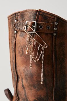 The perfect finishing touch to add to absolutely any footwear, this so cool shoe pin is featured in a safety-pin inspired style with dangly chain detailing for effortless edge. | Chain Shoe Pin by Free People in Gold Cool Shoe, Boot Charms, Boot Chains, Accessory Ideas, Boot Jewelry, Shoe Lace, Charm Set, Clothing Hacks, Gold Star