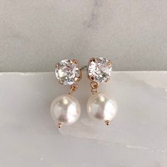 - Silver, gold or rose gold- Choose your own Swarovski pearl color- 1" length- .3" width- Pearl measures 10mm- Comes in signature gift box- Easy returnsThe perfect timeless pearl drop earring for the bride or bridesmaids.Shop the whole collection:https://www.etsy.com/shop/TigerlillyCouture>> Join our mailing list < Elegant Rose Gold Drop Pearl Earrings, Rose Gold Pearl Earrings For Formal Occasions, Classic Rose Gold Pearl Earrings For Parties, Delicate Rose Gold Pearl Earrings For Formal Occasions, Delicate Rose Gold Pearl Earrings For Formal Events, Rose Gold Delicate Pearl Earrings For Formal Occasions, Elegant Rose Gold Pearl Earrings As Gift, Elegant Rose Gold Pearl Earrings For Gift, Elegant Rose Gold Drop Bridal Earrings