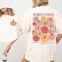 You will love our Comfort Colors fall Christian t-shirt for women. It is based on the Bible verse Matthew 9:37. This Comfort Colors tee comes in 6 beautiful fall colors, pepper, blue spruce, ivory, blossom, berry and denim. This is the perfect autumn top for any women to wear to fall festivals, the pumpkin patch or to a Thanksgiving gathering.   Comfort Colors T shirt Details: 100% ring-spun cotton Medium fabric (6.1 oz/yd² (206.8 g/m Relaxed fit Sewn-in twill label T shirt Care instructions: Ma Fall Tee Shirt Designs, Cute Fall Shirts, Halloween T Shirt Design, Fall Tshirts, Halloween T-shirt, Fall Shirt Designs, Fall Shirt, Fall Christian Shirt Ideas, Fall Tshirt Ideas