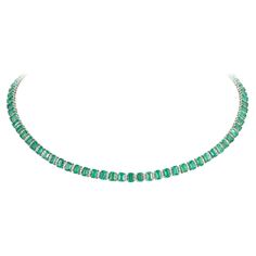 The Following Item we are offering is this Rare Important Radiant 18KT Gold Gorgeous Glittering and Sparkling Magnificent Fancy Cut Emerald and Diamond Necklace. Necklace contains approx 13.50CTS of Beautiful Fancy Emeralds and Diamonds!!! Stones are Very Clean and Extremely Fine!!! This Gorgeous Necklace is a Rare Sample New with Tags Original Price $22,500.00 Comes with Original tags from the Manufacturer that are found in Important Five Star Hotel and Fine Jewelry Stores. A Rare Breathtaking Masterpiece!!! Luxury Faceted Emerald Necklaces, Luxury Classic Brilliant-cut Emerald Necklace, Luxury Faceted Emerald Necklace, Luxury Emerald-cut Emerald Necklace For Formal Occasions, Luxury Fine Jewelry: Polished Emerald Necklace, Sapphire Diamond Necklace, Ruby Bracelet, White Gold Bracelet, Blue Sapphire Diamond