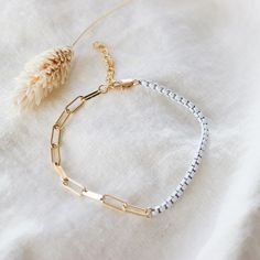 This simple and chunky gold chain Bracelet is must have trendy and versatile for summer. It's a great piece to wear on its own or to layer with your favorite bracelet. -----------------------♡-------------------- D E T A I L S: * 4 Different Colors -----------------------♡-------------------- M A T E R I A L S: * 18k Gold Filled Chain -----------------------♡-------------------- H O W T O O R D E R 1.) Choose the Option (4 Different Colors) in the drop down menu 2.) Choose the Options (Length) i Adjustable 14k Gold-filled Paperclip Chain Bracelet, Adjustable 14k Gold-filled Chain Bracelet, Adjustable 14k Gold Filled Chain Bracelet, Minimalist White Jubilee Chain Bracelet, Adjustable Gold Chain Paperclip Bracelet, White Link Chain Bracelets, Adjustable Gold Plated Paperclip Bracelet, Adjustable Gold-plated Paperclip Bracelet, Dainty Gold Paperclip Bracelet With Adjustable Chain