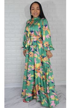 Material: Satin Style: Maxi Dress Long Sleeve Color: Green & Mul Fit True to size. The model is wearing a size Small with 36 Bust Size Recommended Small = 4/6 Medium= 8 Large= 10 XL = 12 1XL= 14