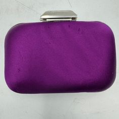 Description Cleverly Crafted To Fit Naturally In Your Hand, This Compact Minaudiere Is Exquisitely Structured With A Detachable Chain Strap And Features A Spacious Interior For All Of Your Day Or Night Essentials. The Cloud Clutch Exudes Effortless Glamour By Jimmy Choo. Details Satin Purple Tone Clasp Detachable, Made In Italy. Good Condition Working, With Minor Stein Inside And Scratches. No Return, See Pics For Detaills. Cloud Texture, Jimmy Choo Bags, Purple Tone, Satin Clutch, Jimmy Choo Bag, The Cloud, Chain Strap, Purple Color, Jimmy Choo