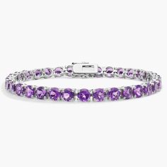 Brightly hued, this amethyst bracelet is crafted in sterling silver and features thirty-four round amethyst gemstones in a flexible single line design. Elegant Lavender Amethyst Bracelets, Elegant Lavender Amethyst Bracelet, Classic Amethyst Bracelets, Luxury Purple Jubilee Bracelet, Elegant Amethyst Bracelet, Elegant Purple Amethyst Tennis Bracelet, Classic Amethyst Gemstone Bracelets, Classic Amethyst Bracelets In Purple, Elegant Sterling Silver Amethyst Gemstone Bracelet