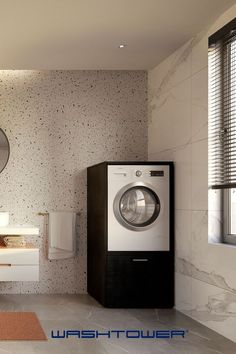 a bathroom with a washer and dryer in it