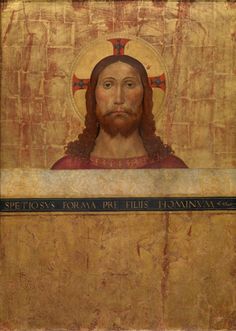 the face of jesus painted in gold and red on an old, stained paper background