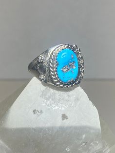 "Turquoise ring southwest band sterling silver women men Size 12 Weight 11.5g Length 3/4\" Width. 3/8\" Thinnest part 1/8\" Free Shipping & Free Postal Insurance Delivered in a Gift Box If you do not want the ring polished and want to leave the natural patina please let me know at the time of purchase as I do polish rings before I ship rings out. Thanks Free First Class shipping and postal insurance is included. If you want to upgrade to priority kindly pay an additional fee to do so. This is re Silver Southwestern Style Rings, Untreated Southwestern Style Ring Jewelry, Southwestern Style Untreated Silver Rings, Western Silver Turquoise Ring Stamped 925, Southwestern 925 Stamped Jewelry For Anniversary, Western Sterling Silver Gemstone Ring, Western Style Sterling Silver Gemstone Ring, Western Style Turquoise Sterling Silver Ring, Southwestern Turquoise Ring In Sterling Silver