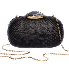 The Dark Sky Oval Clutch is a sophisticated alternative to traditional evening pouches. Made from handwoven natural plant fibers using a centuries-old hat-making technique, this lustrous clutch is a true conversation starter. Featuring a statement agate stone accent capped with hand-tooled brass, it combines artisanal craftsmanship with timeless elegance. Body: 100% handwoven natural plant fiber Chain Strap: Brass Key Features: Artisanal Craftsmanship: Handmade from natural plant fibers, showcas Elegant Formal Woven Bags, Woven Clutch Evening Bag, Black Woven Bags For Formal Occasions, Elegant Woven Clutch, Elegant Woven Clutch For Evening, Elegant Evening Clutch With Woven Details, Elegant Woven Evening Bag, Elegant Woven Evening Clutch, Formal Black Woven Bag