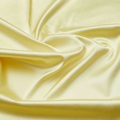 WOVENContents: 100%POLYWeight-Gr/Sqm: 105.00Width: 60"Country of origin: KOREA Yellow Satin, Duchess Satin, Dress Crafts, Evening Outfits, Polyester Dress, Stretch Satin, Polyester Satin, Pale Yellow, Bridal Dress