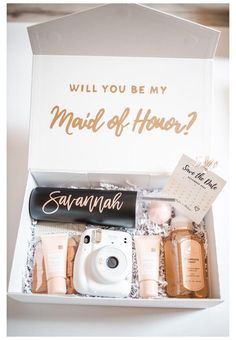 an open box containing personal care items and the words will you be my maid of honor?