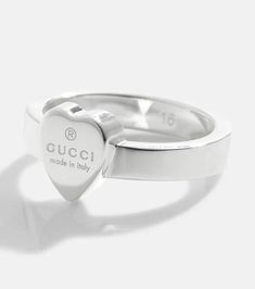 Pledge your love for Gucci with this sterling silver ring. Its heart detail is engraved with branding and a note about its Italian roots. We envision the understated design worn stacked alongside the house's more decadent accessories..Material: 925 sterling silver.Made in Italy.Designer color name: Argento.Max. width 10mm-0.4' Classic Gucci Engraved White Gold Ring, Gucci Fine Jewelry White Gold Rings, Gucci White Gold Fine Jewelry Ring, Gucci White Gold Ring In Fine Jewelry Style, Classic Gucci Engraved Ring For Anniversary, Classic Gucci Engraved Ring As Gift, Classic Gucci Engraved Ring For Gift, Gucci Silver Ring With Polished Finish, Gucci Fine Jewelry Ring For Anniversary