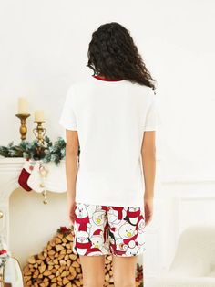 Celebrate the holiday season in style with this Christmas Pajama With Santa Family Matching Set for the whole family. These festive pajamas are designed to bring everyone together, creating picture-perfect moments and cozy nights filled with holiday cheer. Features: Material: Crafted from a soft and cozy polyester blend that feels comfortable against the body, ideal for lounging and sleeping. Design: Features a Santa Claus graphic on each piece, with red trim accents that add a pop of festive co Kids Christmas Pjs, Matching Top And Shorts, Family Pjs, Matching Christmas Pajamas, Create Picture, Christmas Pajama Set, Matching Sweaters, Kimono Pattern, Sleeveless Short Dress