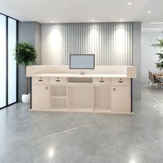 an empty room with a desk and potted plants