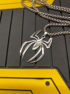 Spider Man Things To Buy, Masc Accessories, Spiderman Jewelry, Spiderman Necklace, Spiderman Accessories, Spiderman Stuff, Spider Logo, Spiderman Gifts, Spiderman Logo