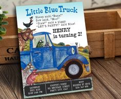 a little blue truck birthday party card on a wooden box