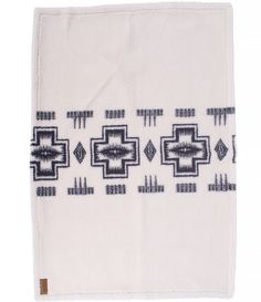 a white towel with black and blue designs on it