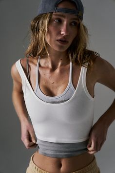 Hit up hot yoga in these sleek and sultry tank featured in a ribbed, second-skin design with a scoop neck and low back. * Moves-with-you-stretch * Fixed wide straps * Cropped silhouette | Hot Shot Crop Top by FP Movement at Free People, White, XS Athleisure Photoshoot, Stylish Workout Clothes, Athletic Wear Womens, Stylish Activewear, Fitness Wear Outfits, Yoga Tank Tops, Performance Leggings, Hot Shots, Yoga Fashion