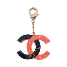 Chanel - (Made in France) Bakelite key ring representing a cc logo. 2017 Cruise Collection. Additional information: Condition: Very good condition Dimensions: Length: 8 cm - Cc dimensions: 5 cm x 3.5 cm Period: 21st Century Seller Reference: BARB3 Luxury Red Jewelry With Channel Set, Chanel Charms, Chanel Charm, 1stdibs Chanel, Chanel Brooch Farfetch, Lets Roll, Cruise Collection, Made In France, Karl Lagerfeld