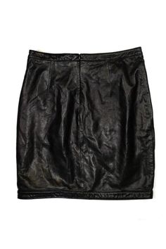 This edgy leather skirt is the perfect transitional piece to have in your closet. Made with a unique cut-out leather panel on the front. Wear it with tights and chic booties for a cool weather look! Size 2 100% lamb leather Back zip closure Above knee- mini Waist 29.5" Hips 36.5" Total length 19" Black Leather Pencil Mini Skirt, Edgy Leather Skirt For Night Out, Fitted Leather Pencil Skirt For Fall, Fitted Black Leather Pencil Skirt, Fitted Leather Pencil Skirt For Spring, Black Leather Mini Skirt For Fall, Black Leather Pencil Skirt For Night Out, Leather Lined Skirt For Night Out, Leather Pencil Mini Skirt For Fall