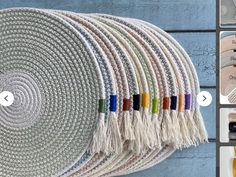 a wall hanging made out of woven material with colorful tassels on the ends