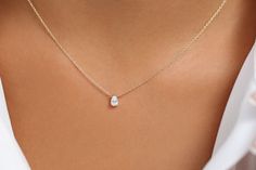 "Pear Shaped Diamond Necklace/ 14K Gold Pear Shape Diamond Choker Necklace/ Pear Shape Diamond Necklace / Black Friday Item Details * Made to Order. * Gold Kt: 14K (Please message me if you want 18K) * Custom Gold Color: Rose Gold, Yellow Gold, White Gold * Pear Shape Diamond: 1 pc 5.5 x 3.5MM * Total Number of Stones: 1 * Total CTW: 0.23 Ctw * Diamond Color-Clarity: G Color Si Clarity * Setting Type: Prong * Ready to Ship in 7-10 Business Days If you have any additional questions about this pro Elegant Pear-shaped Single Diamond Necklace, Dainty Pear-shaped White Gold Necklace, Dainty Briolette Necklace For Formal Occasions, 14k Gold Teardrop Necklace With Single Diamond, Fine Jewelry Pear-shaped Necklaces For Wedding, Fine Jewelry Pear-shaped Necklace For Wedding, Dainty Pear-shaped Diamond Necklace, Dainty Yellow Gold Teardrop Solitaire Necklace, Timeless Pear-shaped Wedding Necklace